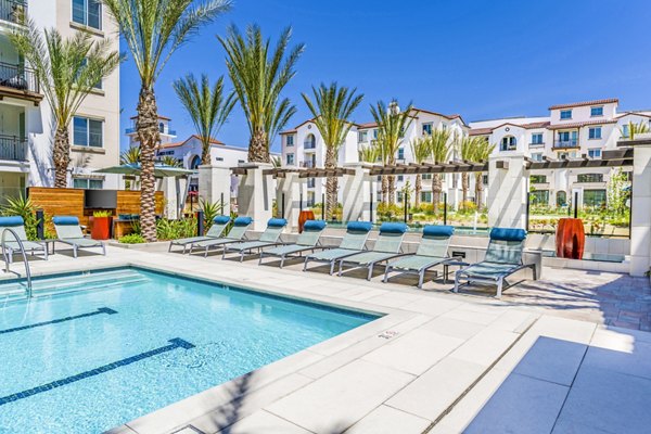 Resort-style pool at Sola at Pacific Highlands Ranch Apartments offering lush landscapes and luxury leisure spaces