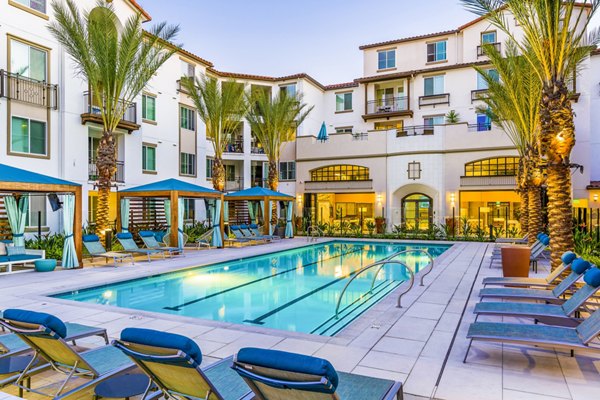 Sunlit pool at Sola at Pacific Highlands Ranch Apartments