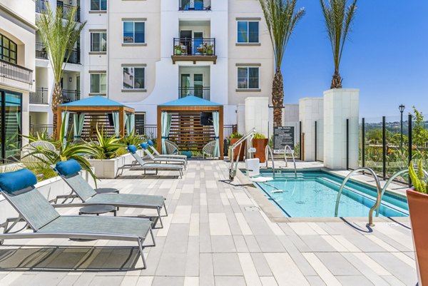 Hot tub on patio at Sola at Pacific Highlands Ranch Apartments offering relaxation and luxury living in a serene environment