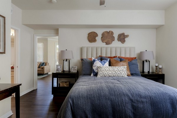 Cozy bedroom with modern decor at Missions at Sunbow Apartments