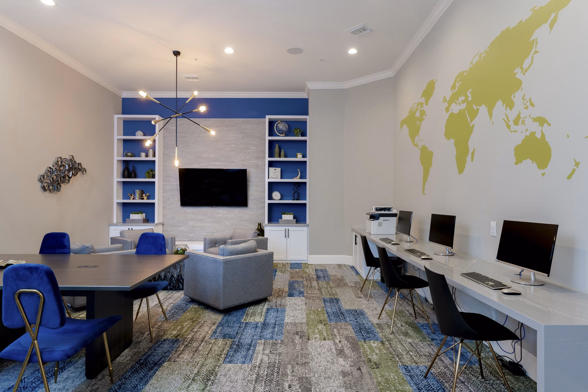 Modern business center with collaborative workspaces at Missions at Sunbow Apartments