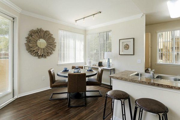 Stylish dining area with modern furnishings at Missions at Sunbow Apartments
