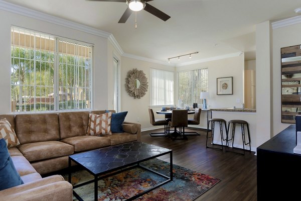Spacious living room with modern decor at Missions at Sunbow Apartments
