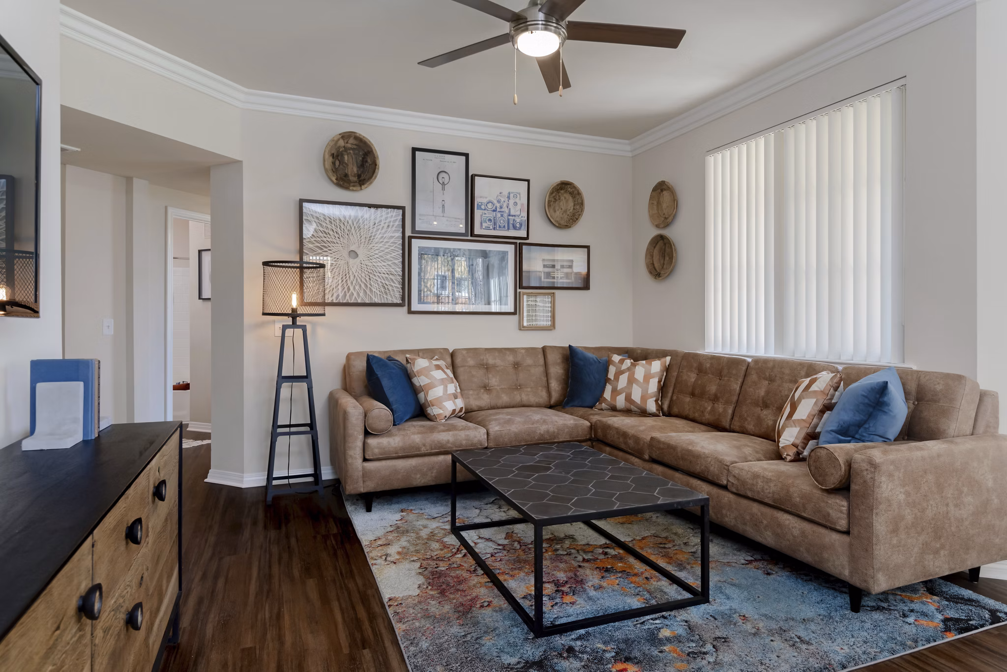 Spacious living room with modern decor at Missions at Sunbow Apartments in Chula Vista, offering comfort and style in luxury apartments