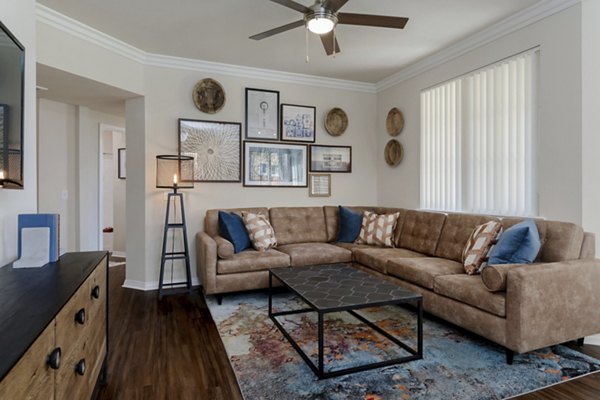 Spacious living room with modern decor at Missions at Sunbow Apartments in Chula Vista, offering comfort and style in luxury apartments