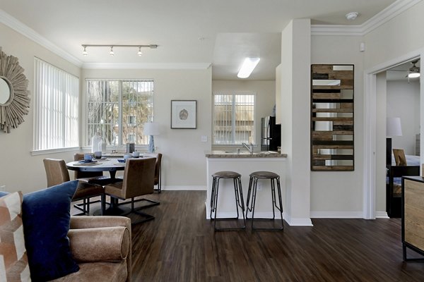 Spacious living room with modern decor in Missions at Sunbow Apartments, offering luxury lifestyle in a premium Chula Vista location