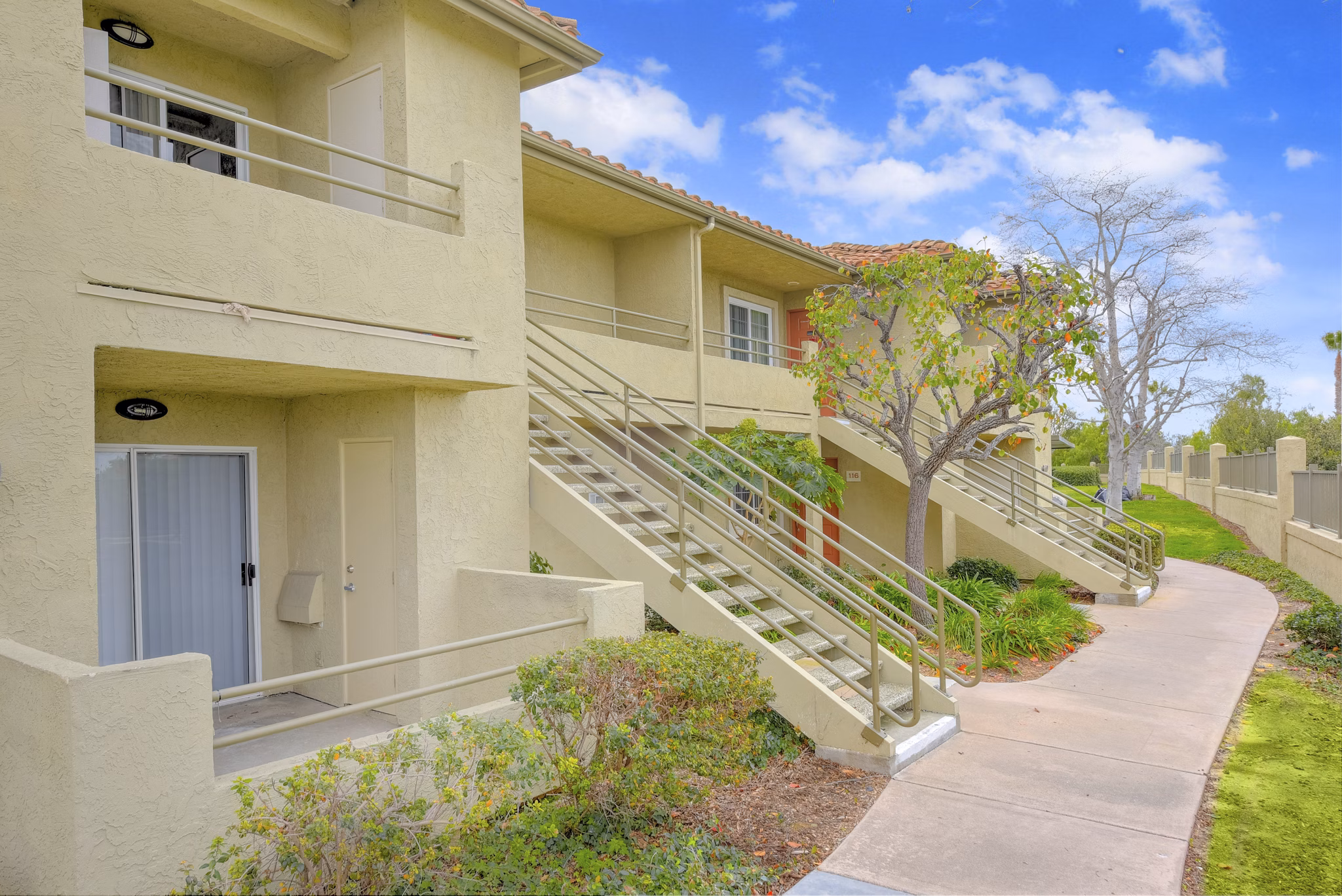 Sunbow Villas: Contemporary luxury apartments surrounded by lush landscaping in Chula Vista