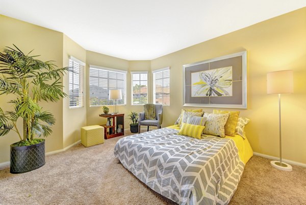 Cozy bedroom with modern decor in Sunbow Villas Apartments
