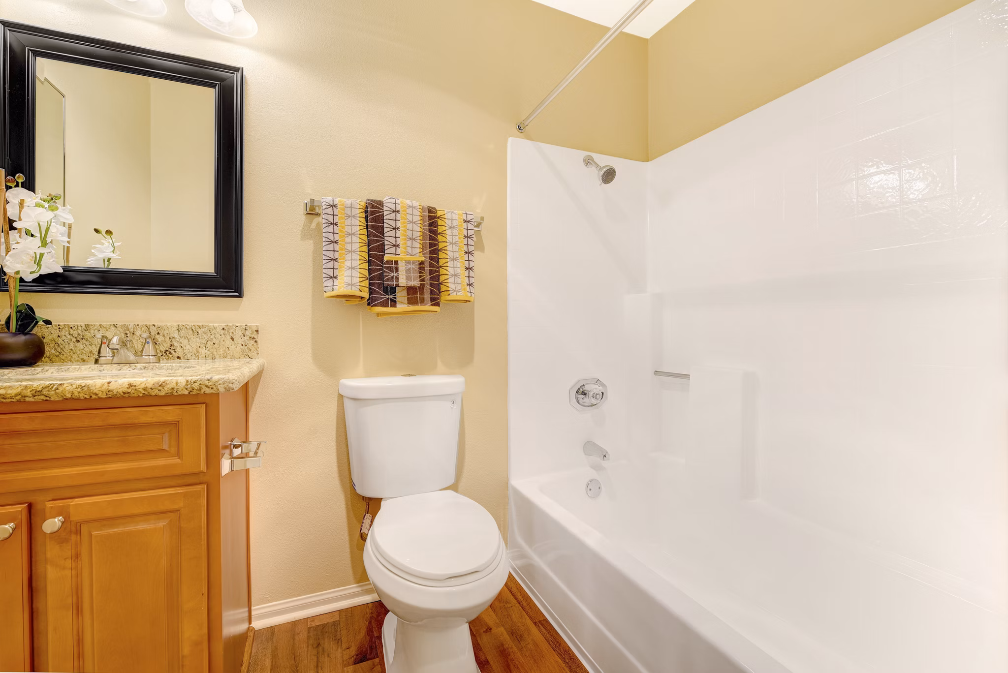 Modern bathroom with sleek fixtures at Sunbow Villas Apartments, offering luxury living for residents in a serene community