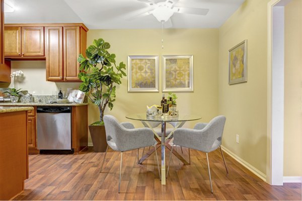 Elegant dining room with modern decor at Sunbow Villas Apartments