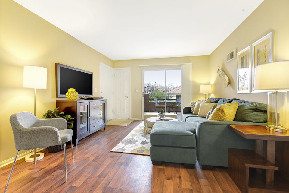 Spacious living room with modern decor in Sunbow Villas Apartments, luxury apartments by Greystar located in a prime area