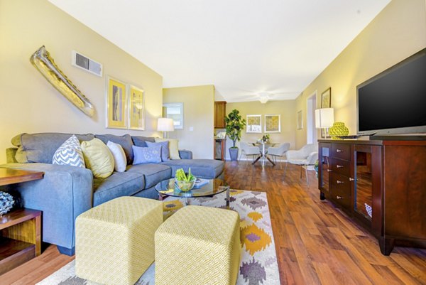 Modern living room with contemporary decor and spacious layout at Sunbow Villas Apartments