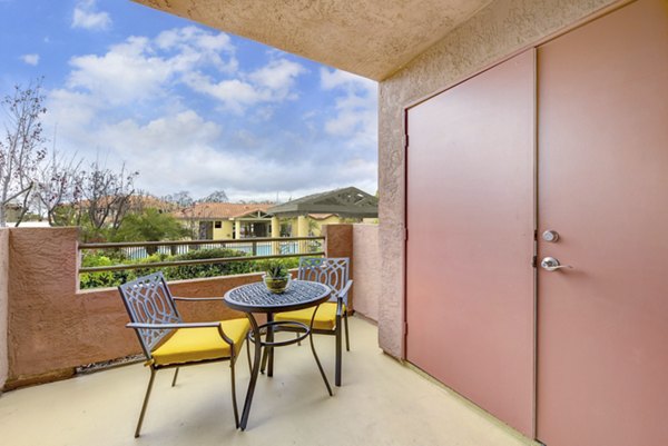 Patio balcony with city views at Sunbow Villas Apartments, a luxury community by Greystar