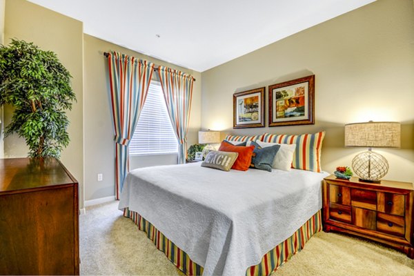 Modern bedroom with stylish decor at Tavera Apartments, featuring luxury amenities and contemporary design Perfect for upscale living