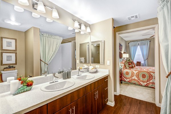 Contemporary bathroom featuring sleek fixtures at Tavera Apartments luxury apartments