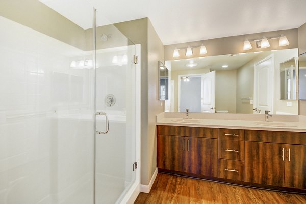 Modern bathroom with sleek fixtures at Tavera Apartments luxury complex