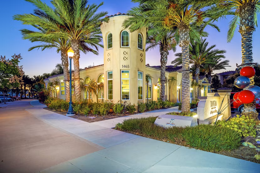 Clubhouse leasing office featuring modern design at Tavera Apartments in a luxury setting