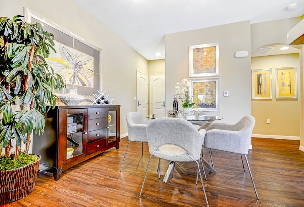 Dining room with modern decor and natural light at Tavera Apartments luxury apartments
