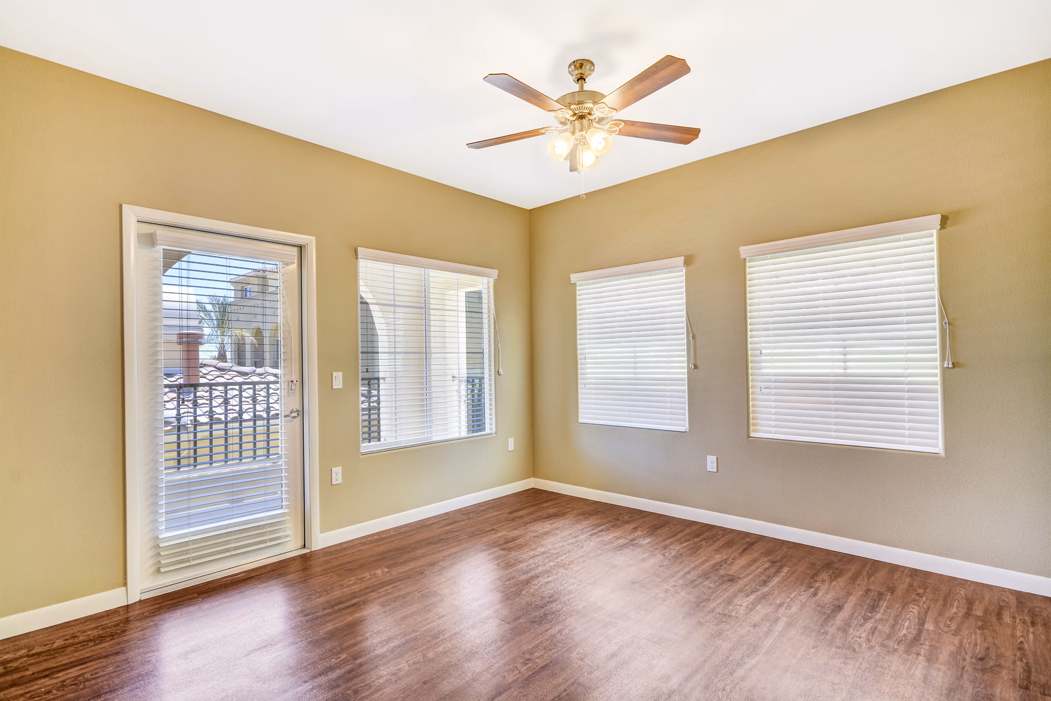 Spacious living room with modern decor and natural light in Tavera Apartments