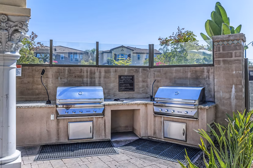Grill area with modern outdoor seating at Tavera Apartments, Greystar luxury apartments in a vibrant community setting