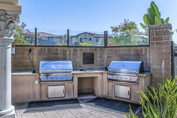 Grill area with modern outdoor seating at Tavera Apartments, Greystar luxury apartments in a vibrant community setting