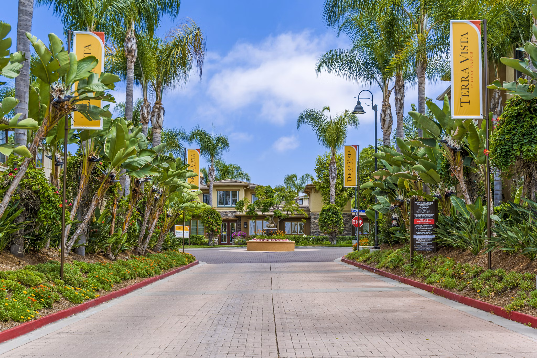 Terra Vista Apartments: Elegant entryway with contemporary design in a luxury apartment community