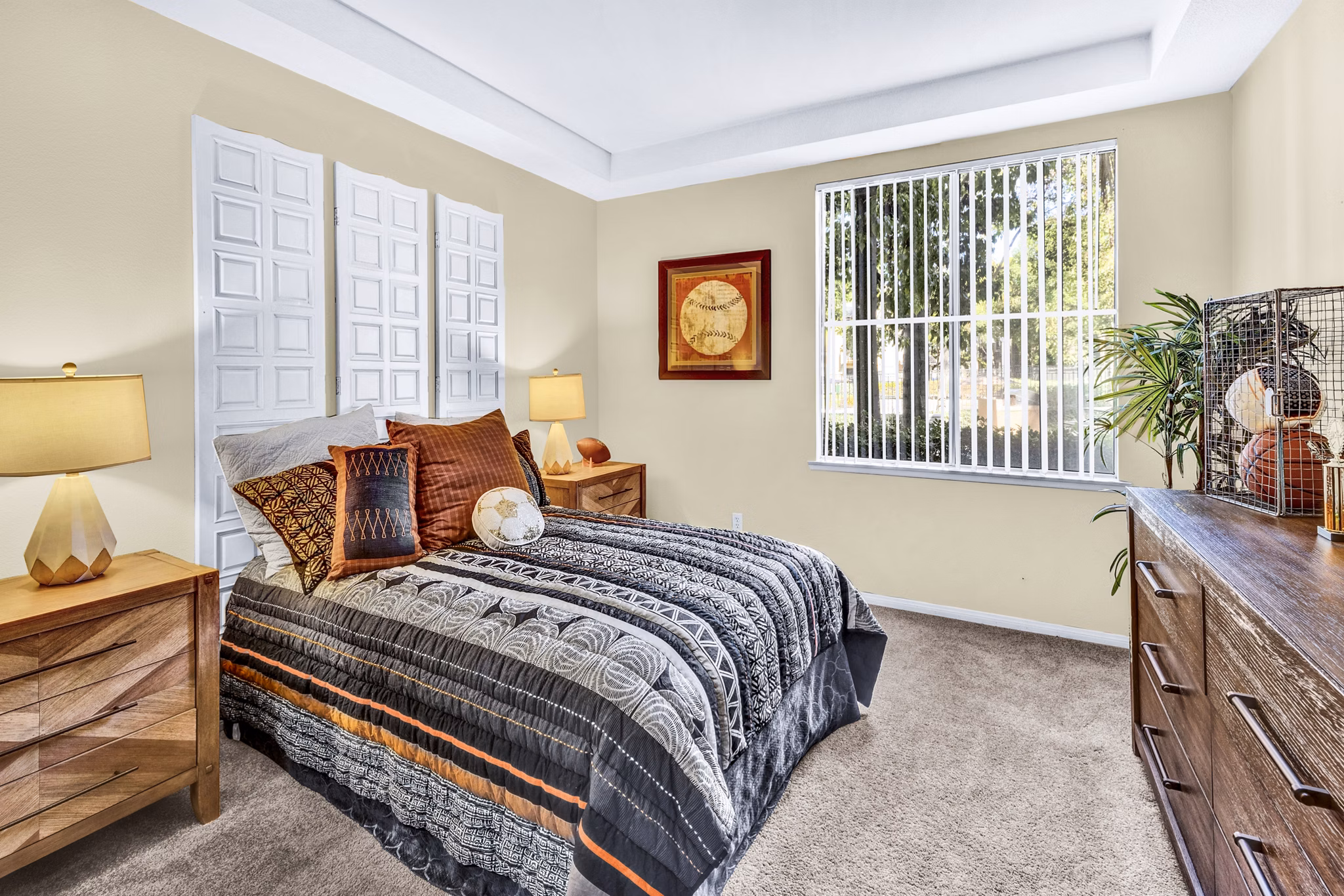 Cozy bedroom with modern furnishings at Terra Vista Apartments, ideal for comfort and relaxation in luxury living