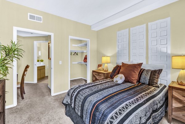 Bright bedroom with stylish decor at Terra Vista Apartments: Luxury living in Chula Vista, CA.