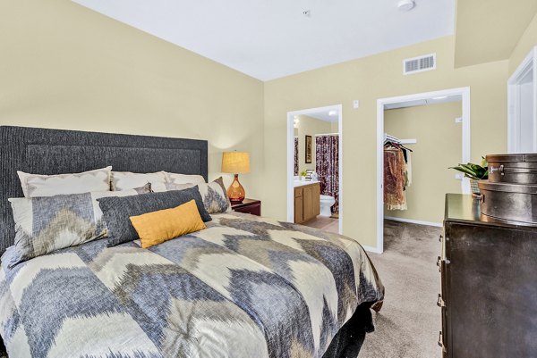 Cozy bedroom with stylish decor at Terra Vista Apartments in the Greystar luxury community