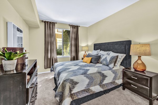 Cozy bedroom with modern decor at Terra Vista Apartments