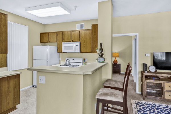 Bright dining room with elegant furnishings at Terra Vista Apartments