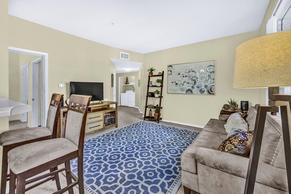 Spacious living room with modern design elements at Terra Vista Apartments, a luxury community by Greystar