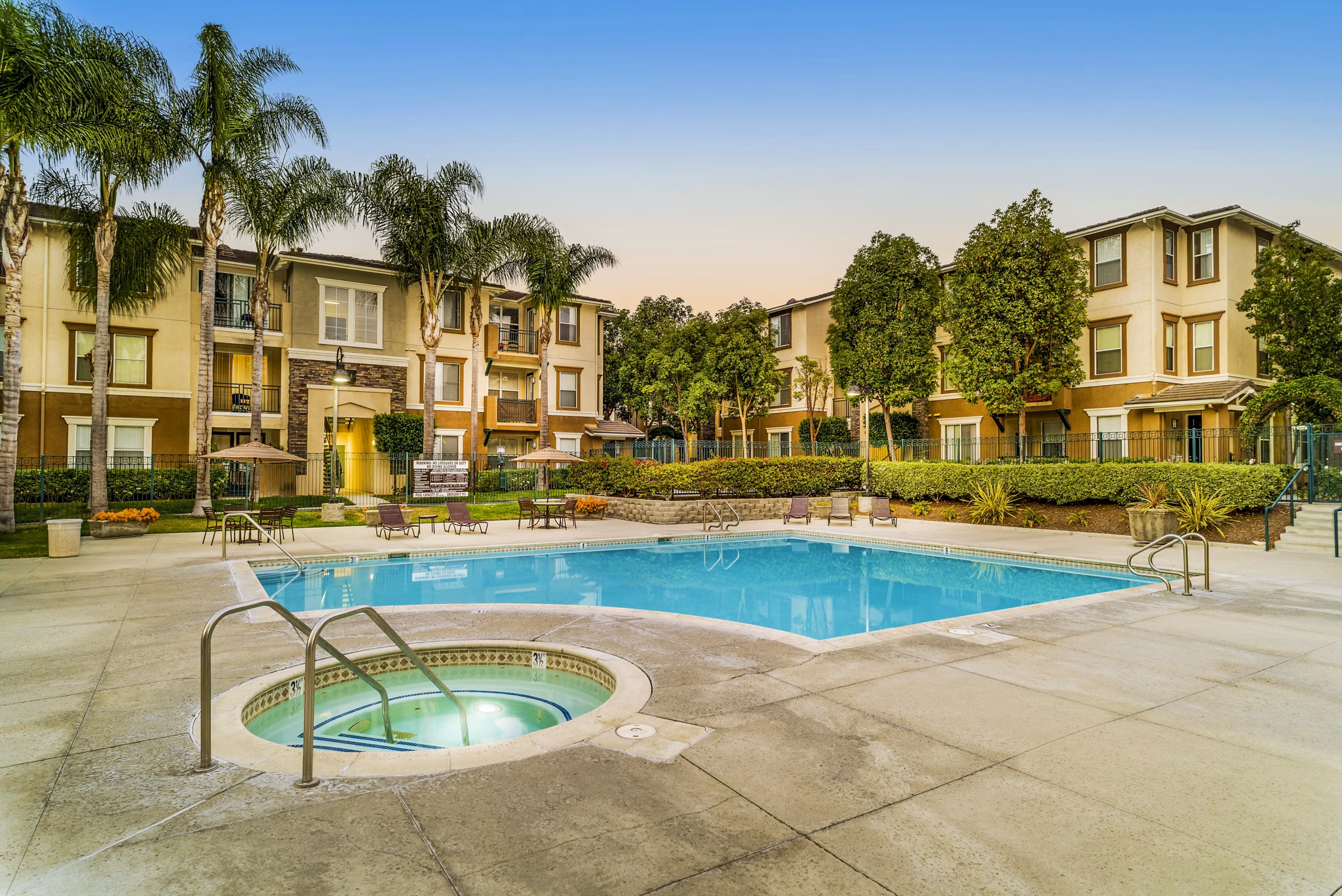 Luxury outdoor pool at Terra Vista Apartments offering serene views for a relaxing experience