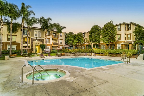 Luxury outdoor pool at Terra Vista Apartments offering serene views for a relaxing experience