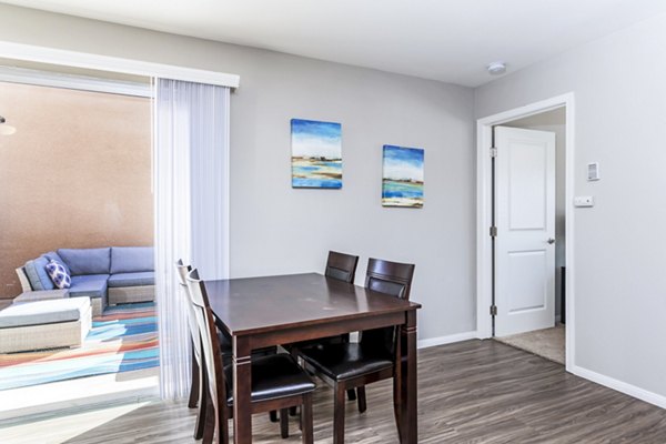 Dining room with modern furnishings at Village Square Apartments luxury living