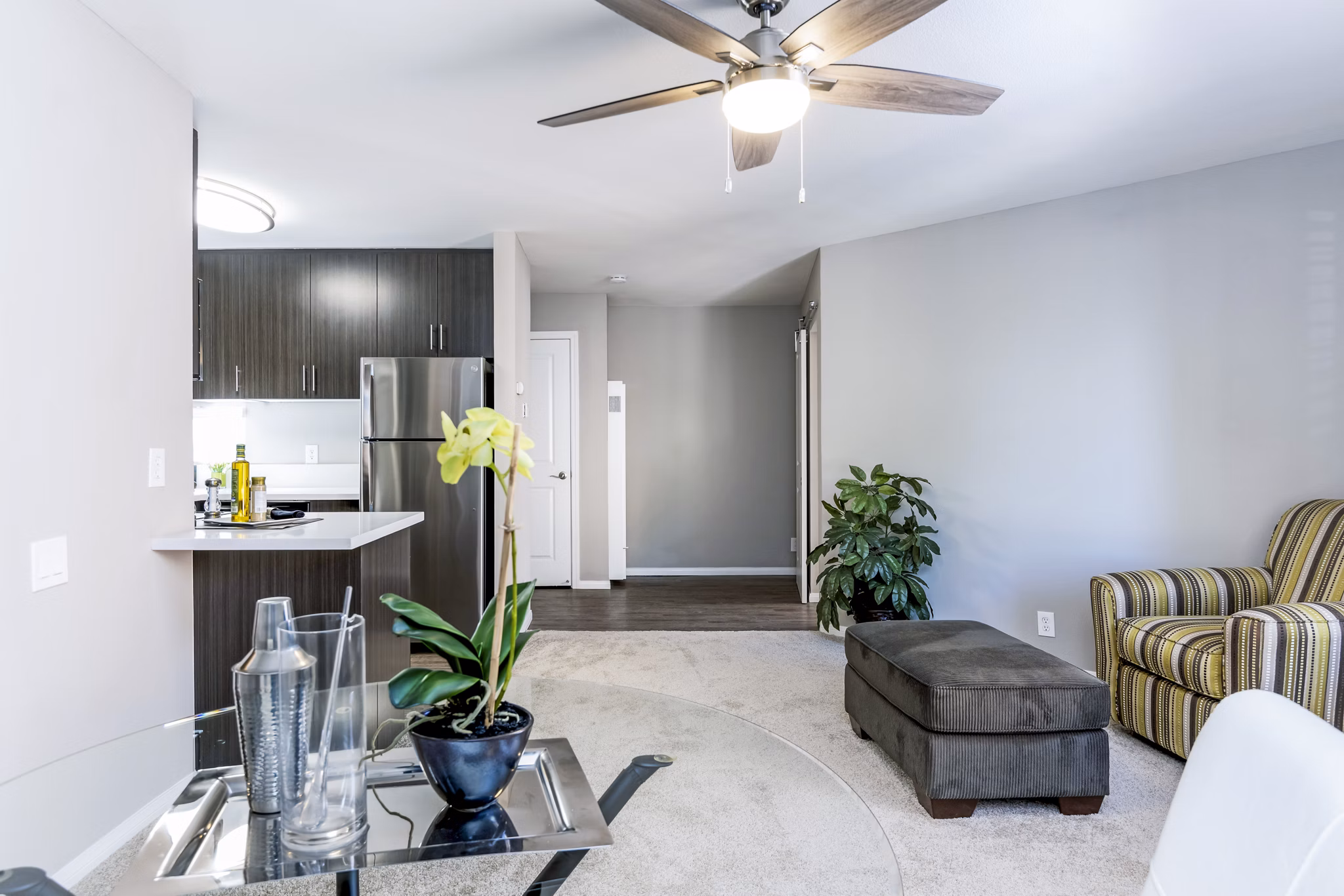 Cozy living room with modern decor at Village Square Apartments
