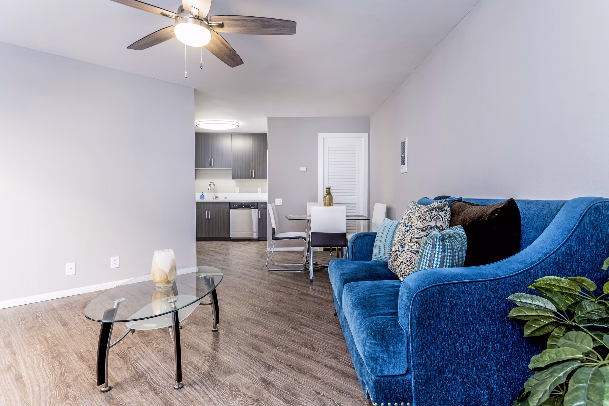 Spacious living room with modern decor in Village Square Apartments
