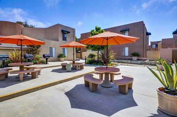 grill area at Village Square Apartments