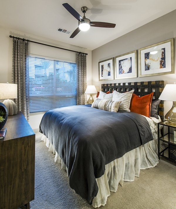 Modern bedroom with stylish furnishings at Vora Mission Valley West Apartments