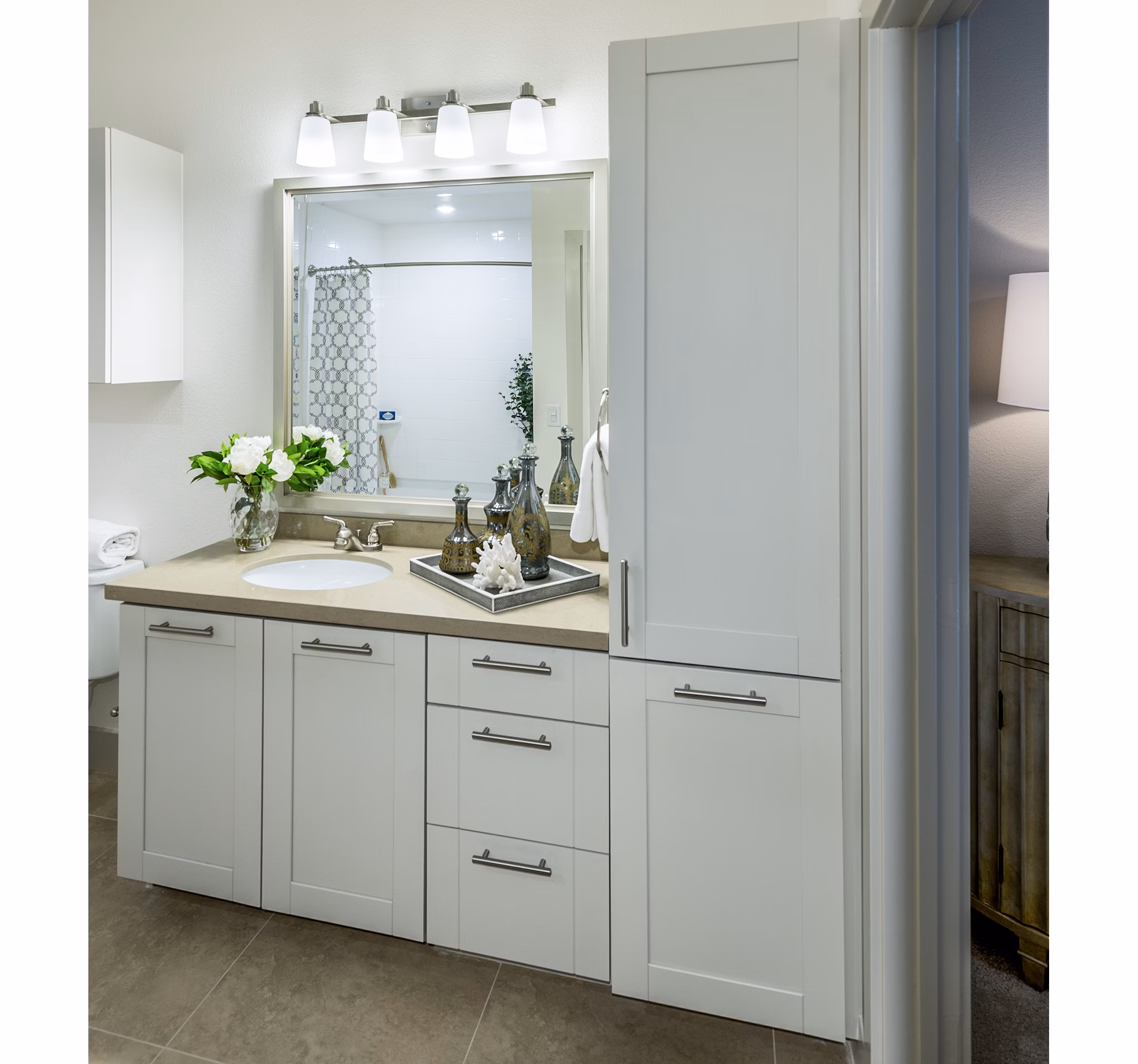 Bathroom featuring modern fixtures and sleek design in Vora Mission Valley West Apartments