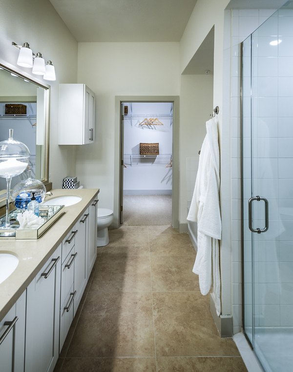 Modern bathroom with elegant fixtures at Vora Mission Valley West Apartments, offering luxury living in San Diego
