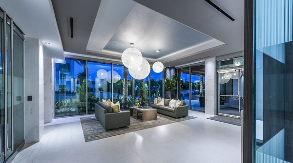 Clubhouse lobby with elegant seating and modern decor at Vora Mission Valley West Apartments