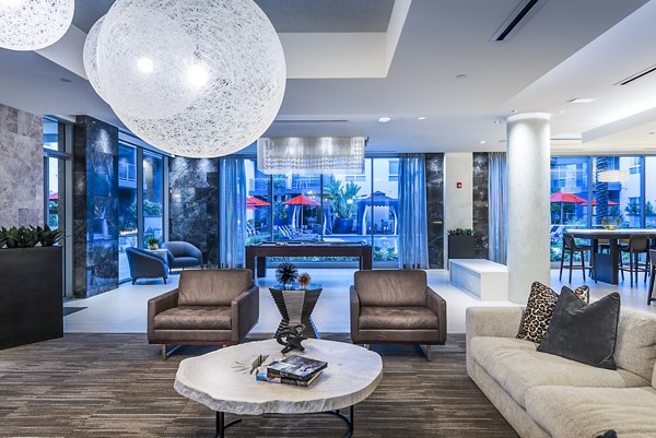 Modern clubhouse with stylish seating and entertainment options at Vora Mission Valley West Apartments