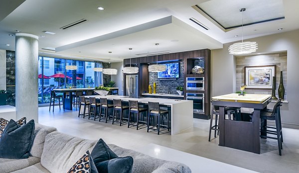 Elegant clubhouse lobby with modern furnishings at Vora Mission Valley West Apartments