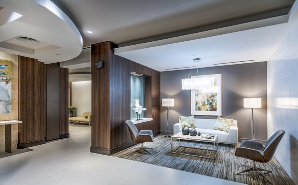 Clubhouse featuring modern design and cozy seating at Vora Mission Valley West Apartments