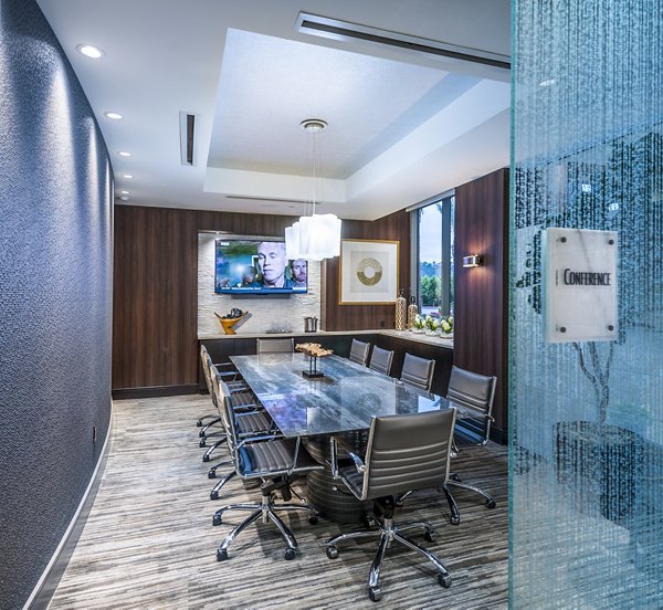 Meeting facility with large conference table and modern decor at Vora Mission Valley West Apartments