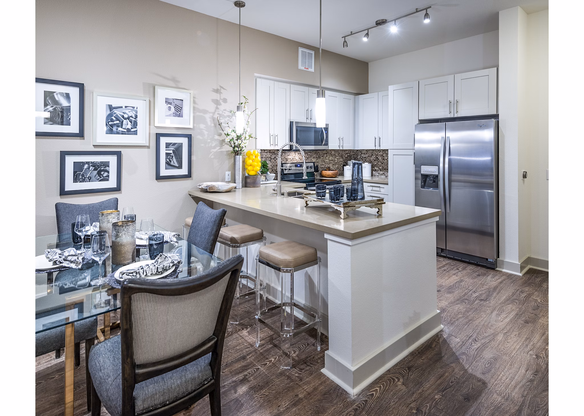 Dining room featuring elegant dining set and modern lighting at Vora Mission Valley West Apartments