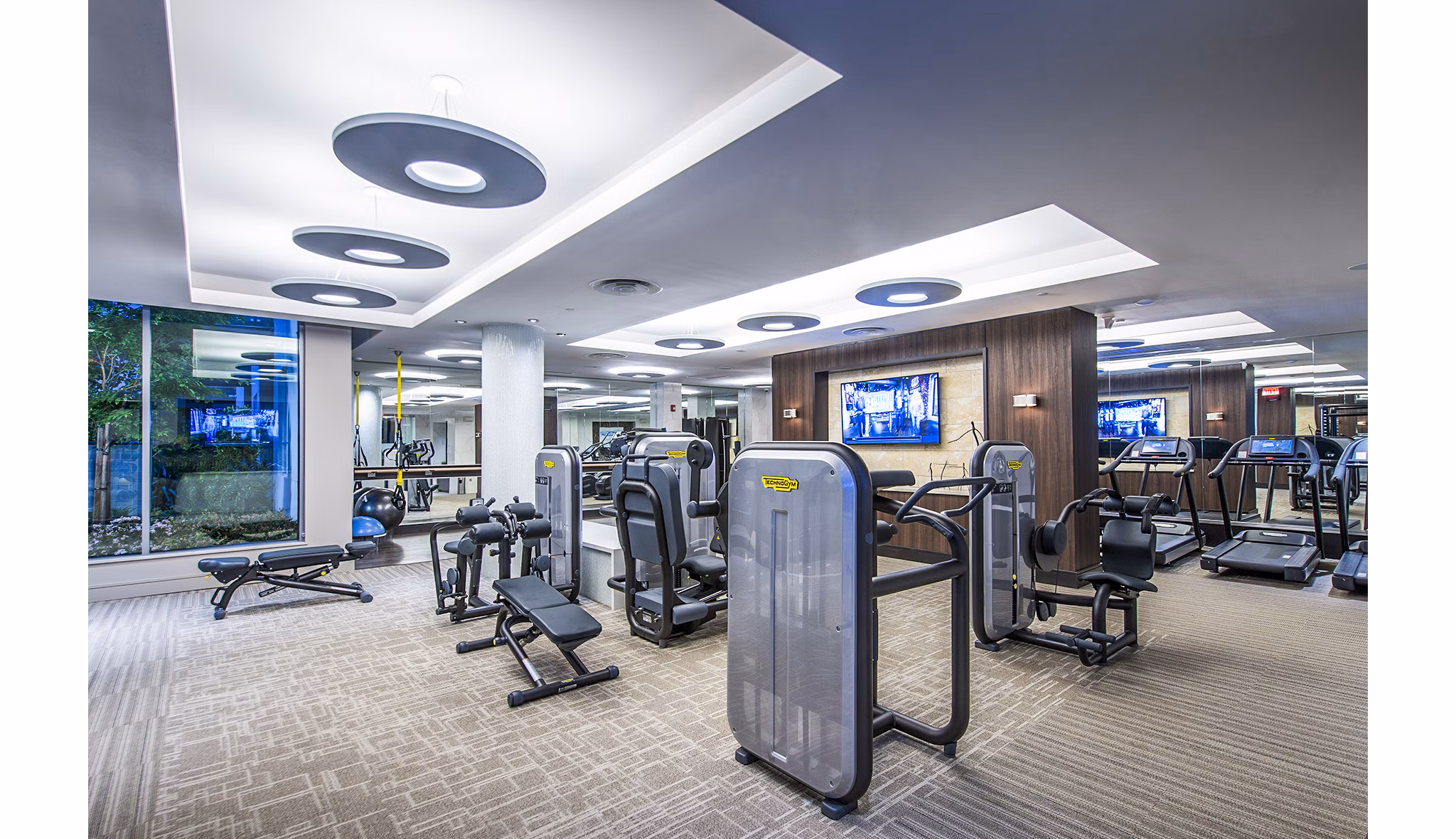 Modern fitness center equipped with state-of-the-art equipment at Vora Mission Valley West Apartments