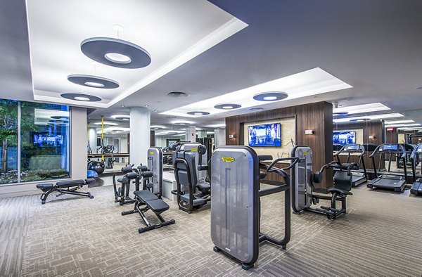 Modern fitness center equipped with state-of-the-art equipment at Vora Mission Valley West Apartments