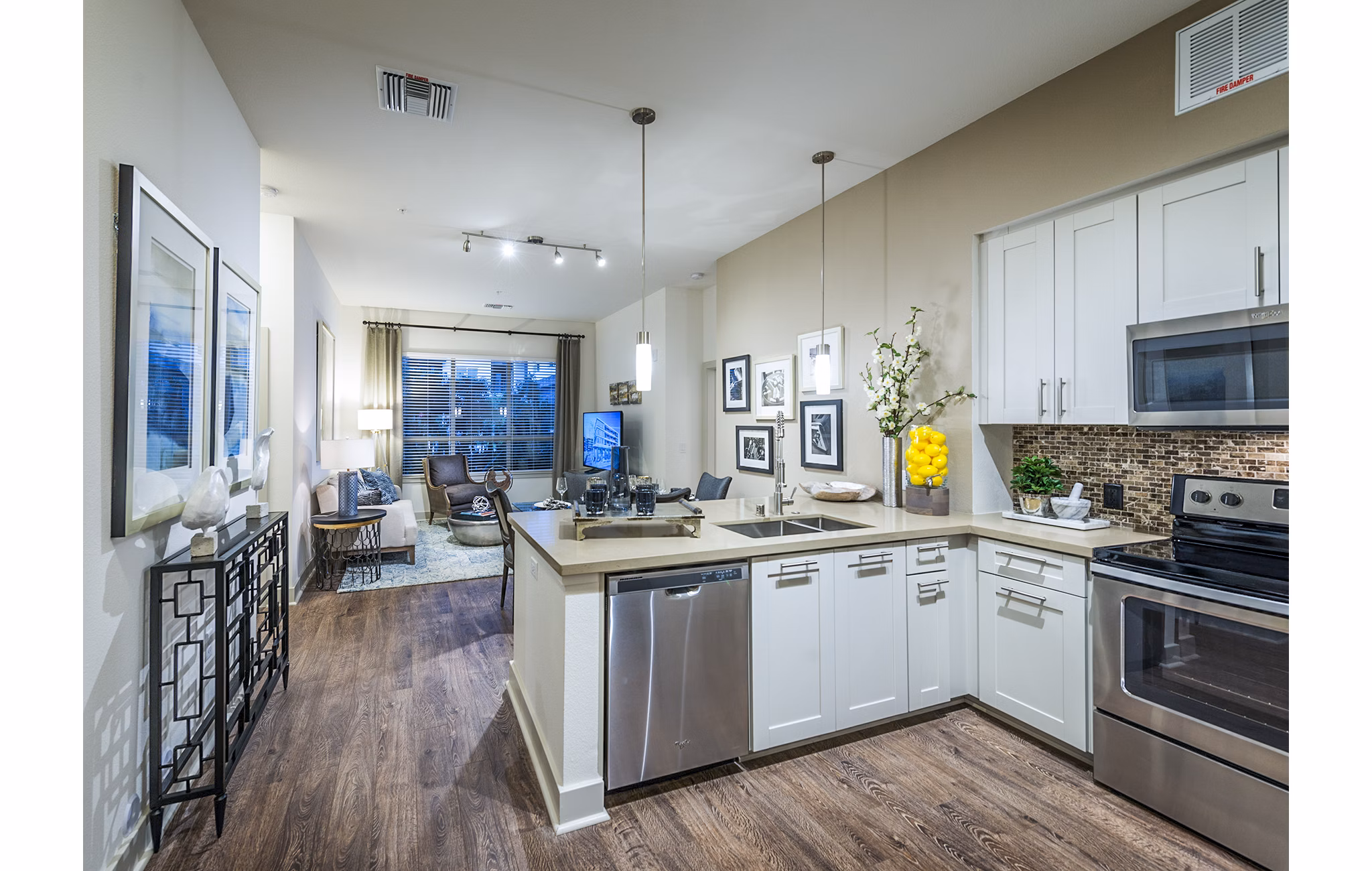 Modern kitchen with stainless steel appliances at Vora Mission Valley West Apartments